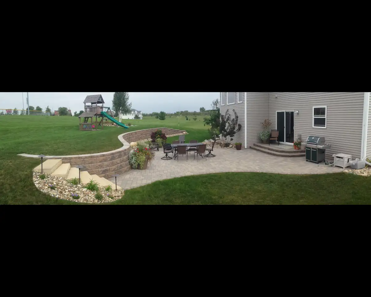 Custom paver patio installation in Waterloo, Iowa by Matthias Landscaping