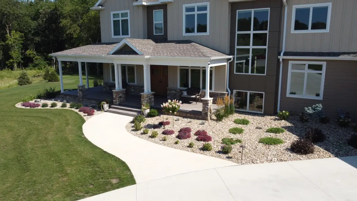 Aerial view of multi-level paver patio with fire pit in Waterloo, Iowa