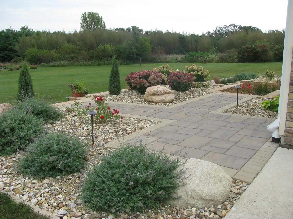Paver patio with retaining wall and steps in Cedar Falls