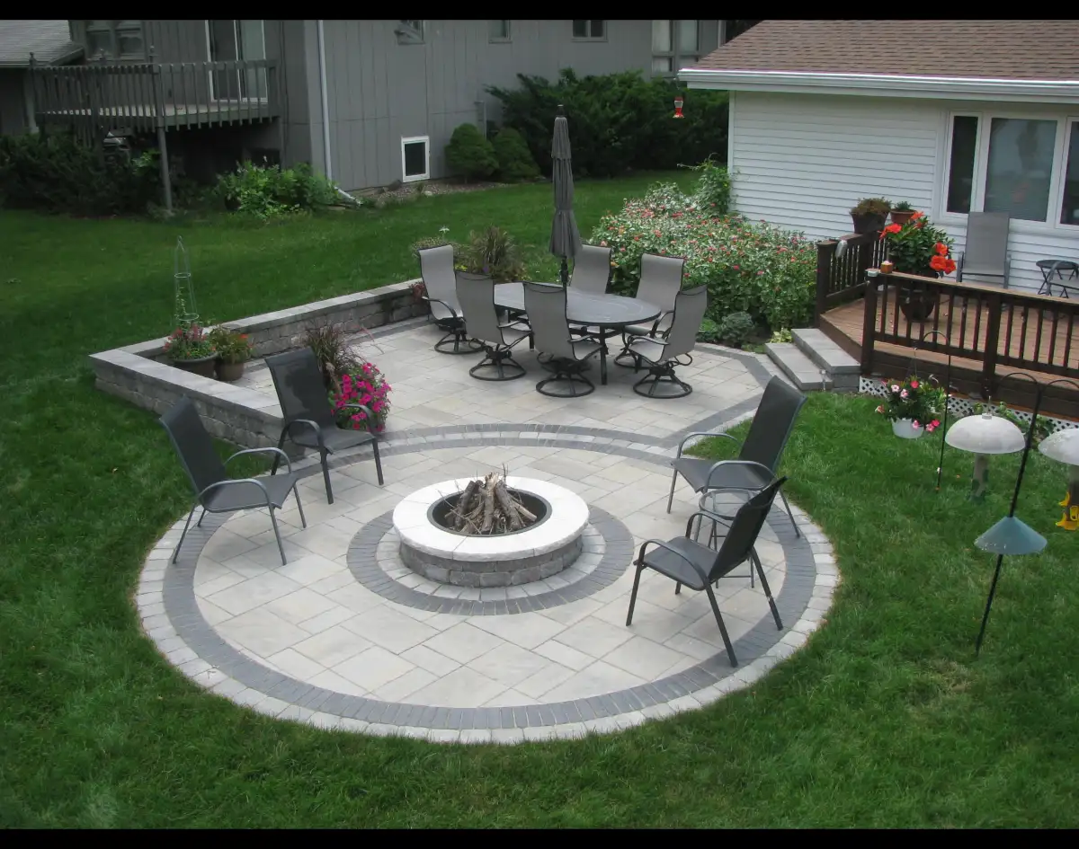 Completed two-zone paver patio demonstrating proper base preparation results