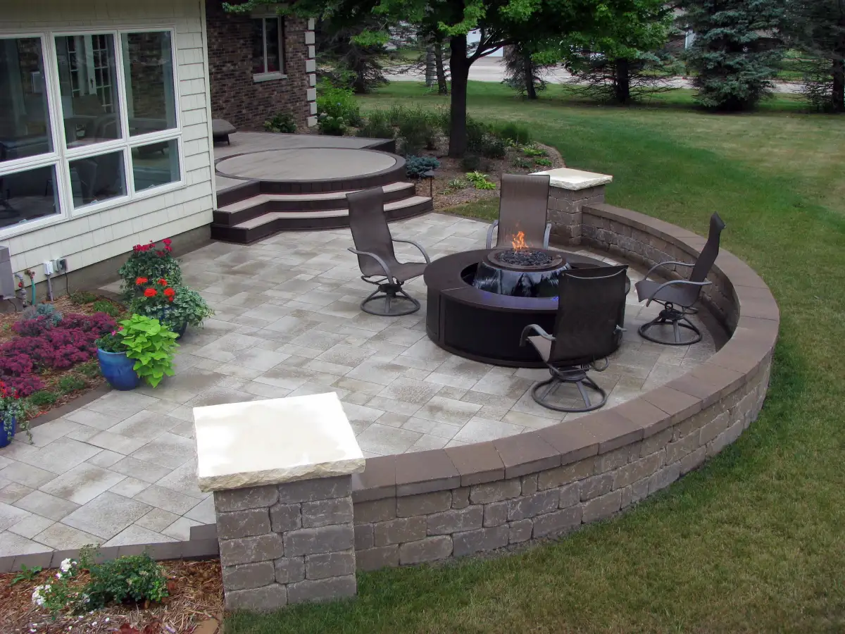 Custom garden bed with fresh mulch and shrub plantings in Waterloo, Iowa