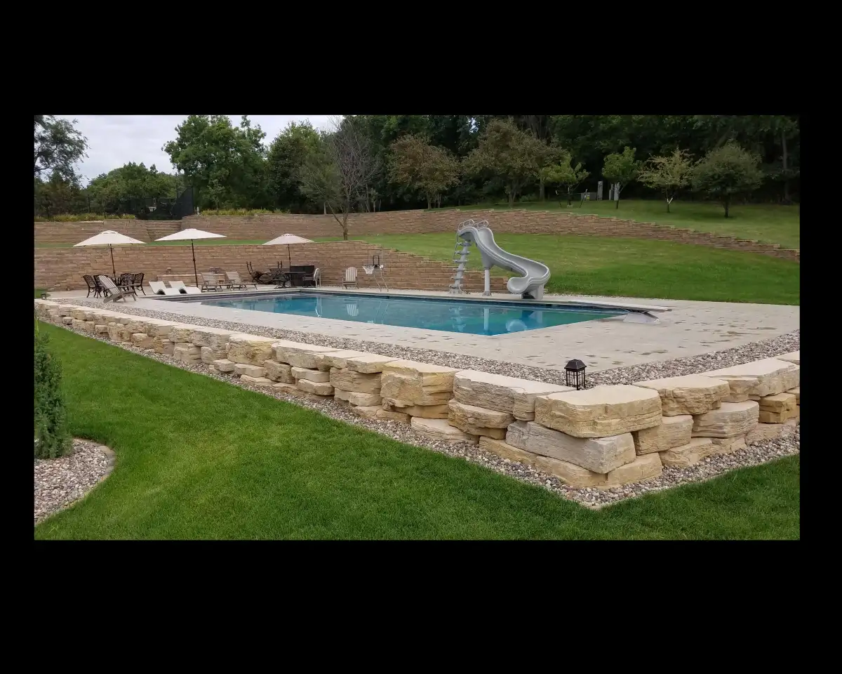 Complete outdoor living space with patio, seating, and landscaping