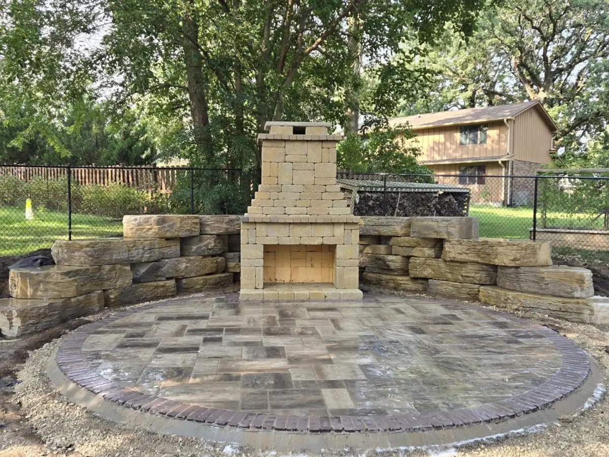 Custom outdoor living space with fire feature in Cedar Falls, Iowa