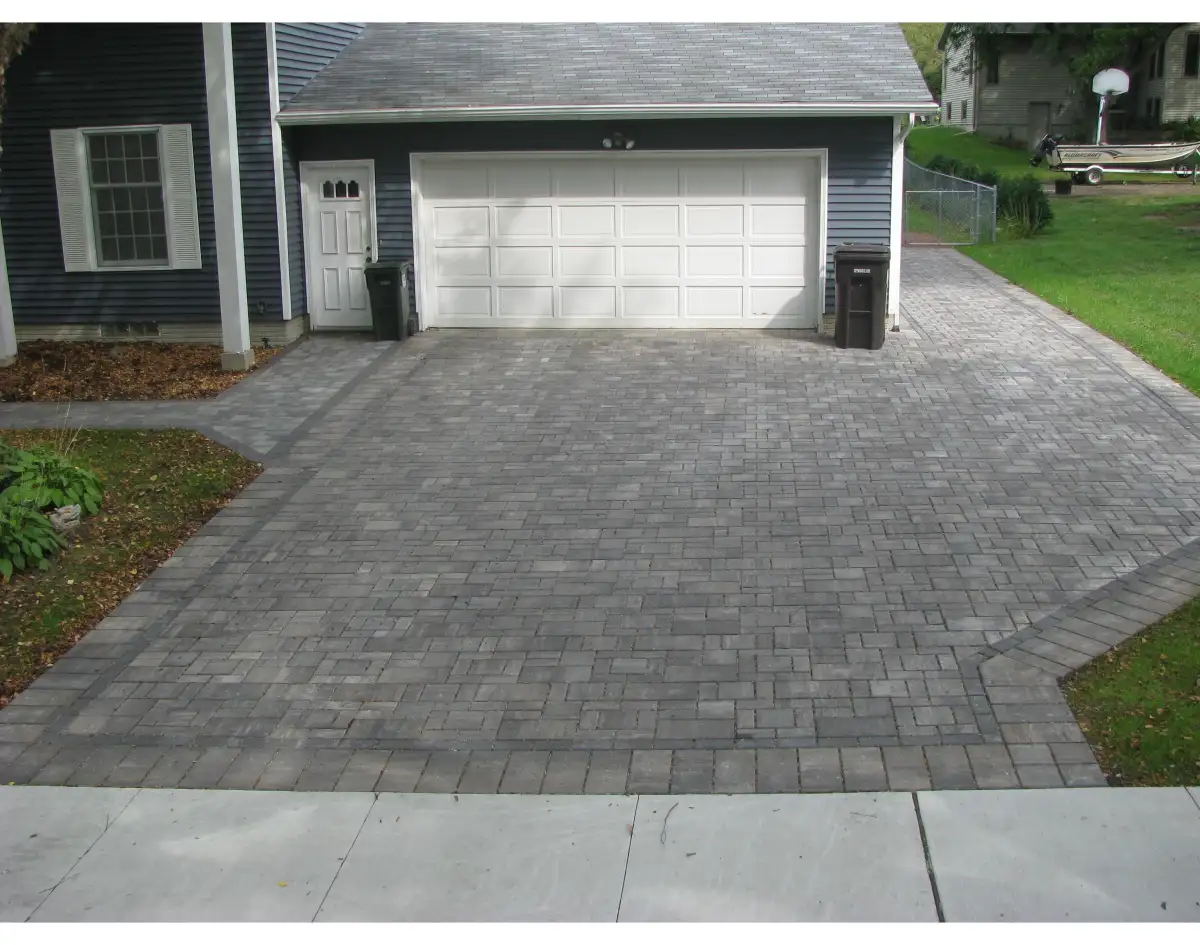 Paver patio with custom border design completed in the Cedar Valley