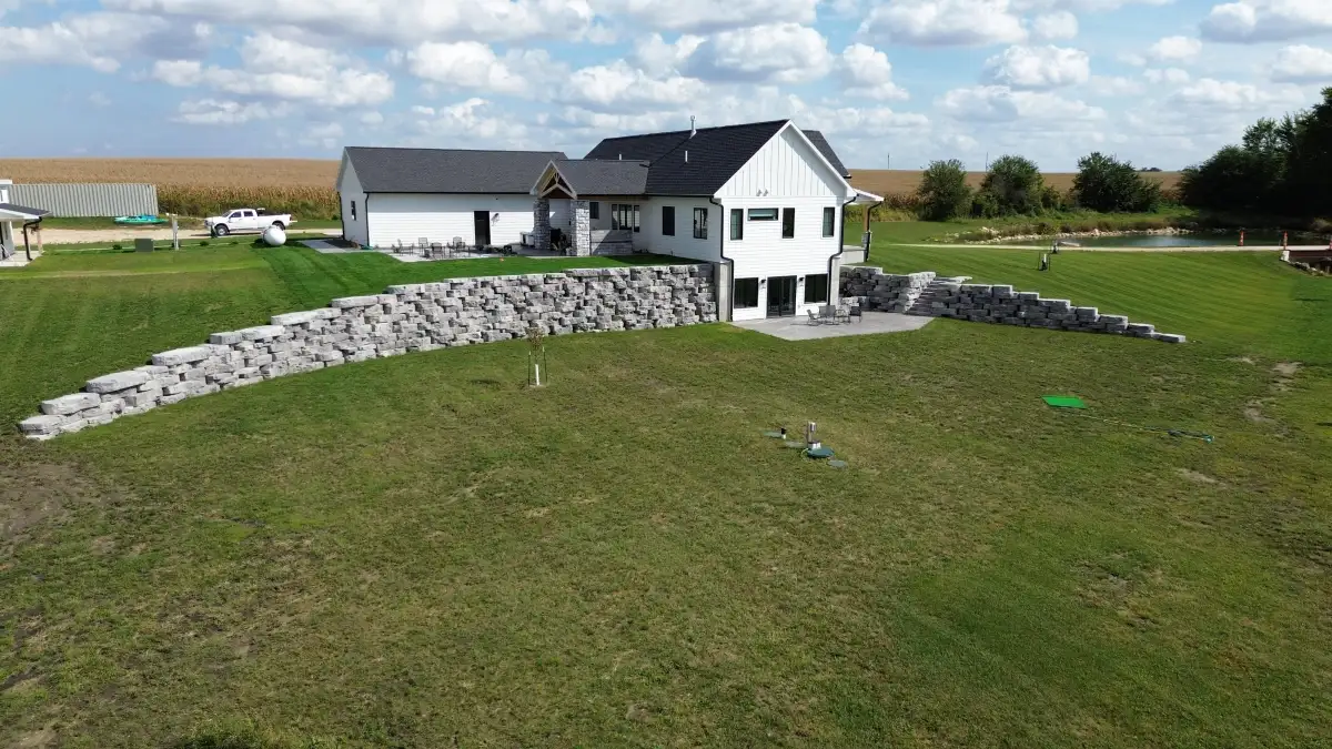 Concrete block retaining wall construction in Waterloo, Iowa